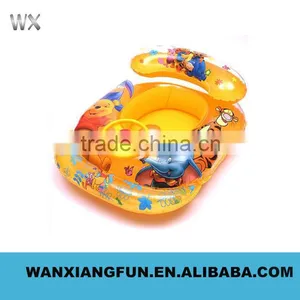 Baby Using Inflatable Swim Boat thumbnail-3