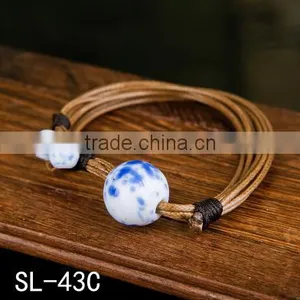 New Summer Cord Braided Porcelain Flower Charm Bracelet thumbnail-1