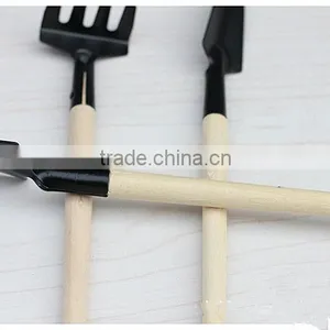 Mini Steel Garden Rake With Wood Handle thumbnail-1
