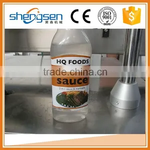 Widely Use Competitive Price Three Sides Semi Automatic Pet Label Machine thumbnail-3