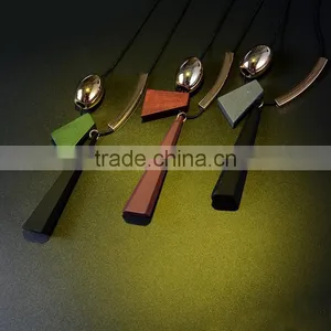Geometric Wood Bead Pendant Necklace Gold Curved Tube Bead Black Chain Necklace Geomotric Rubber Pendant Long Sweater Necklace thumbnail-2
