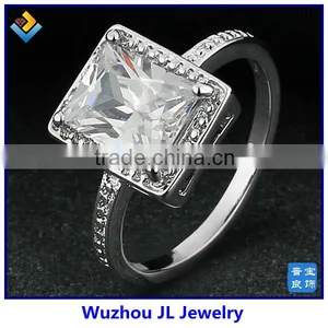 White Emerald Cut Rectangle CZ In Copper Alloy Ring thumbnail-1