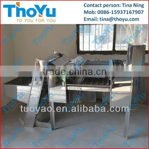 Thoyu Brand Automatic Eggs Shell Breaking and Removing Machine SMS: 0086-15937167907 thumbnail-1