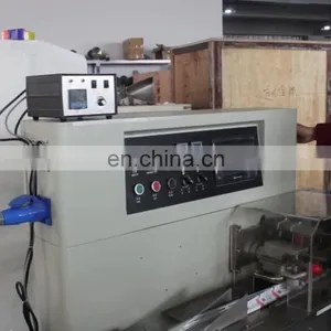 China Supplier Rice Cake Packaging Machine Washrag Parcel Wrapping Machine thumbnail-1