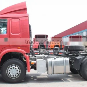 LOW PRICE SINOTRUK 4X2 371HP HOWO TRACTOR TRUCK HEAD thumbnail-4