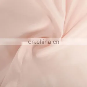 Chinese Popular Colorful Microfiber Polyester Peach Skin Fabric Soft Shell Best Clothing Fabric for Beach Shorts, Garment thumbnail-4