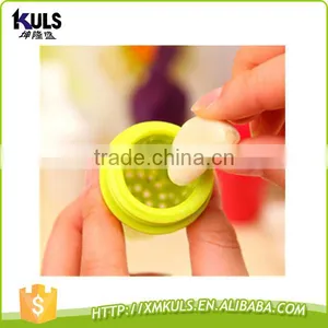 Small Plastic Tool for Mashing Garlic thumbnail-3