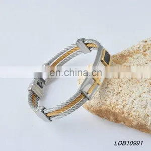 Cross Magnet With Gold And Silver Plating Bracelate thumbnail-1