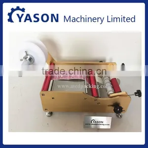 YS-L100 Manual Round Bottle Labeling Machine thumbnail-1