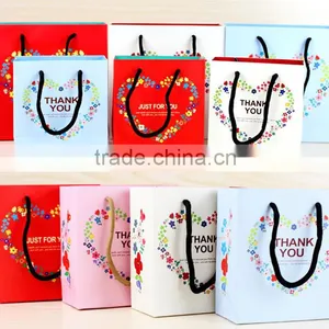 China Wholesale Handbags Shoes Clothing Packaging Paper Bags With Handles thumbnail-1