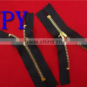 Highly Polished Gold Metal Zipper thumbnail-1