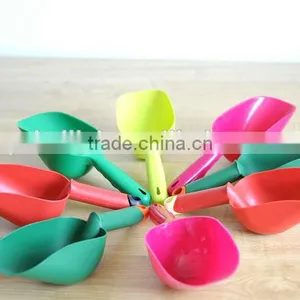 Short Handled Kids Use Plastic Shovels thumbnail-1