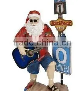 Polyresin Figurine Santa Claus With Guitar Prd7 thumbnail-1