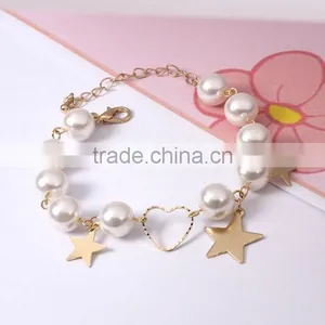 Gold Heart Star Charms Pearl Link Bracelet thumbnail-1
