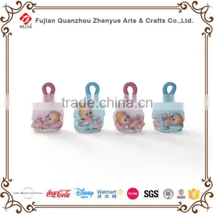 Polyresin Baby Sculpture With Chair Shoes Horse Photo Frame Leaf Holding Baby Figurine Resin Cute Baby Statue thumbnail-1