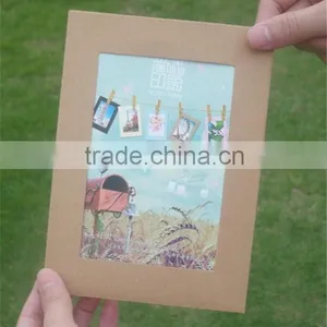 Recyclable Paper Picture Photo Frames Hanging Over at the Rope With Wood Clamp thumbnail-4