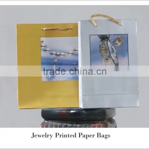 Paper Carry Bags for Showrooms With Design Printed thumbnail-3