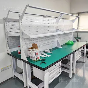 Ergonomic Industrial Steel Workbench With Adjustable Legs, Deep Drawers, and Anti-Static Top for High-end Home Workshops. thumbnail-1
