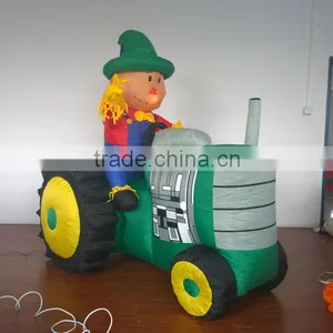 Animated Inflatable Farmer/Peasant Toy on Green Tractor With Yellow Wheels thumbnail-4