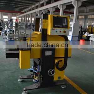 Automatic Double Station in Mould Labeling for Blow Moulding Machine thumbnail-1