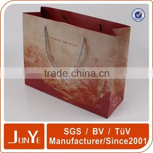 Promotional Paper Carry Shopping Packaging Bags in Clothes thumbnail-1
