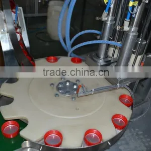 Automatic Filling Foil Into the Cap Machine thumbnail-2