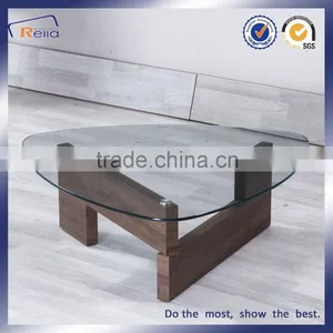 Oval Glass Top Wooden Leg Coffee Table Made in China thumbnail-1
