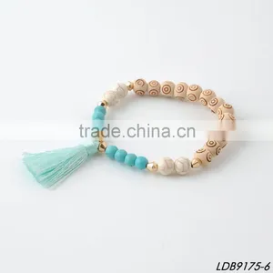 Turquoise Stone Bead Spiritual Wooden Bead Bracelet With Tassel thumbnail-6