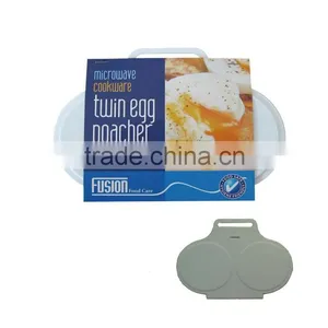 A HANDY TWIN EGG POACHER W/HINGED LID IN MICROWAVE OVEN thumbnail-1