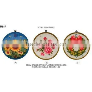 M587 CROSS STITCH PLASTIC FRAME CLOCK thumbnail-1