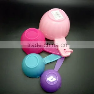 Colorful Set of 4 Plastic Measuring Cups and Spoons thumbnail-1