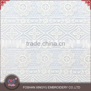 Hot Sale Promotional Cheap Cutwork Lace Embroidery Designs African Net Lace Fabric Netting Stretch Mesh thumbnail-2
