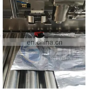 Fengtou Luggage Automatic Filling and Capping Machine / Aseptic Milk BIB Filling Line System thumbnail-4