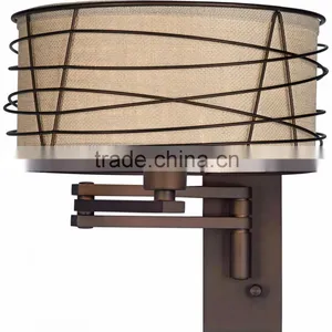 1031-1 Wire Cage Detail Surrounds a Burlap Shade a Rich Bronze Metal Swing Arm Wall Lamp thumbnail-2