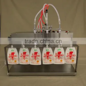 Hot Sale 3 Nozzles Liquid Spout Bag Filling Machine For Milk Juice thumbnail-1