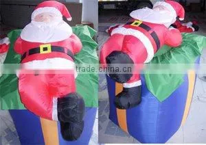 Air Blown Santa Lying on Parcel thumbnail-1