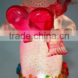 Holding a Red Heart Acrylic Snowman With LED Light thumbnail-4
