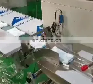 Automatic Disposable Surgical N95 Face Medical Flow Wrapping Horizontal Packaging Machine thumbnail-1