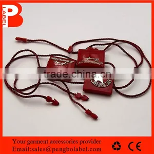 Garment Hang Tag Use Plastic Gold Foil Print Seal Tag String With Customized Logo Supplier's Choice thumbnail-6