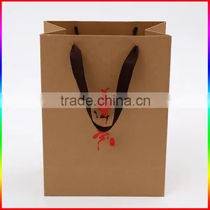 Brown Kraft Paper Packing Bag Packing Box With Red Foil Printing and Ribbon thumbnail-4