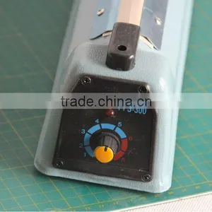 2015 New Hot Selling Professional Manual Iron Body Hand Heat Press Sealing Machine thumbnail-5