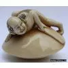 Mammoth Netsuke - Man on Disk thumbnail-1