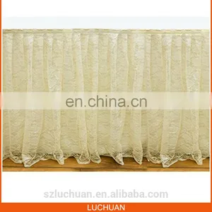 Shiny Ivory Lace Table Skirt Designs For Wedding thumbnail-1
