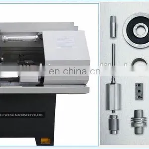 Small Auto Machine CNC Lathe Bar Feeder System thumbnail-6