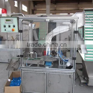 Automatic Filling Foil Into the Cap Machine thumbnail-1