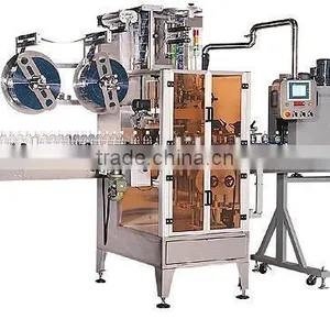 Sleeve Labeling Machine With Label Shrinking Tunnel and Steam Generator thumbnail-1