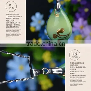 Elegant Glazed Ceramic Flower Rain Drop Pendant Necklace thumbnail-5