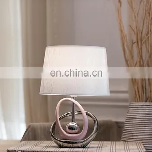 Japan Unique Ceramic Desk Lamp Hotel Bedside Cheap Custom Nordic Pink Nightstand Lamp With Logo thumbnail-1