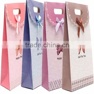 Handmade Art Paper 4C Printing Packaging Handled Paper Bags thumbnail-1