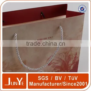 Promotional Paper Carry Shopping Packaging Bags in Clothes thumbnail-4